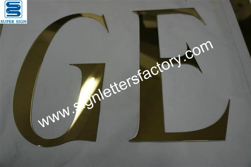 mirror brass letter signage